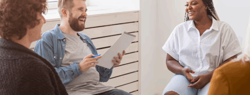 A group of lgbtq individuals in a group therapy.