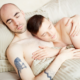 An image of a gay couple intimately embracing each other, highlighting the importance of HIV prevention tips for LGBTQ individuals.